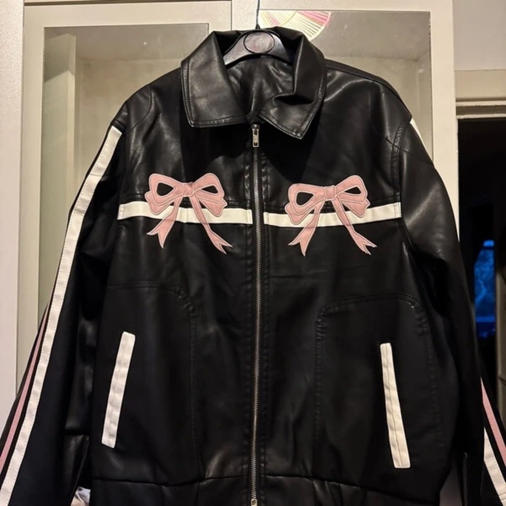 Elegant Black Leather Jacket with Pink Bow Details